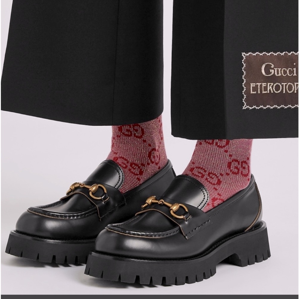 GUCCI. Lug sole loafers, black leather, size 38.5